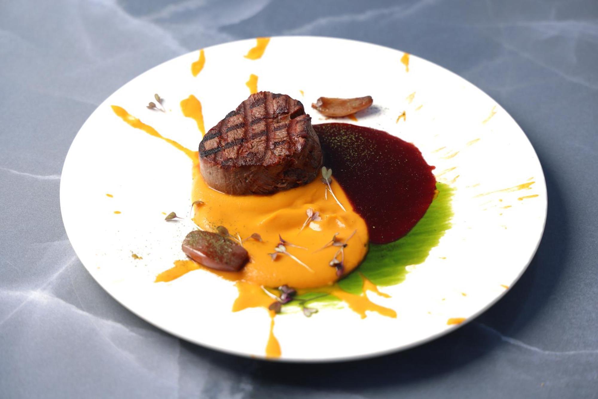 Alia Palace Hotel - Adults Only 16+ Chalkidiki Eksteriør billede A steak with a pumpkin sauce